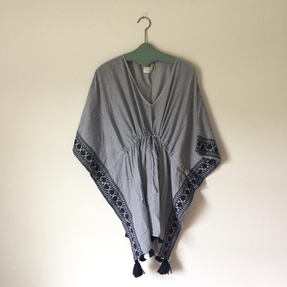 Poncho/Beach cover-up w/ embroidery detail.